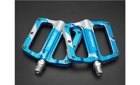 PEDAL ROCKBROSS PLATAFORMA ROLETADO ALUM. AZUL/BRANCO