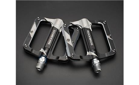 PEDAL ROCKBROSS PLATAFORMA ROLETADO ALUM. PRETO/BRANCO